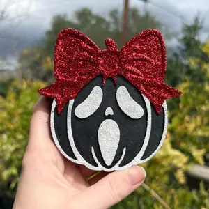 Scream in Pumpkin Car Freshie with Red Glitter Bow Decorative Accessory
