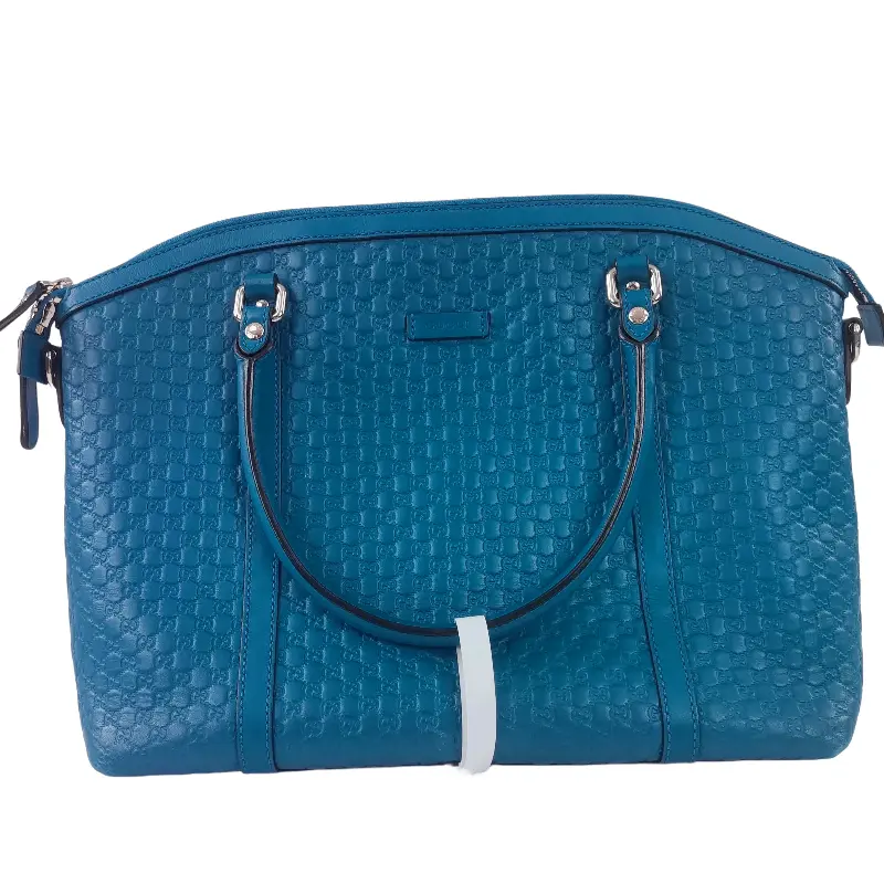 Pre-owned GUCCI leather handbag teal GG embossed dome satchel with top handles and shoulder strap. qg519
