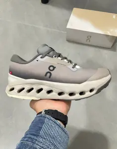 Obsessed with this sleek monochromatic grey gradient running sneaker, ultra-lightweight and cushioned for workouts and streetwear