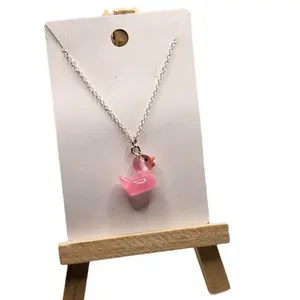 Pink Rubber Ducky Necklace with Glow in the Dark Feature Unisex Fun Playful Accessory High-Quality Durable Long-Lasting