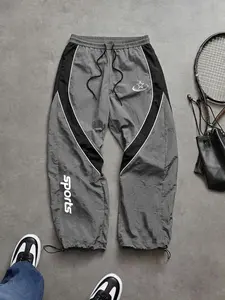 100% Nylon Men's Hip Hop Streetwear Pants, Color Block Panel Design, Quick Dry Breathable, Elastic Waist, Drawstring Cuffs, Sports Graphic Print Jogger Pants