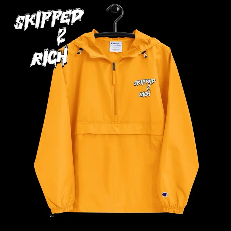 Champion Embroidered Skipped2RichxChampion Packable Jacket - Wind & Rain Resistant 100% Polyester with Hood and Kangaroo Pocket - Menswear