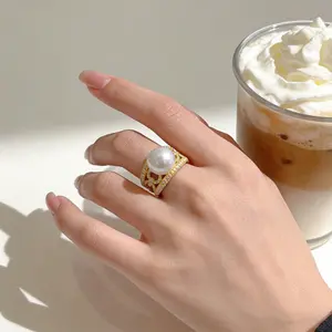 1PC exquisite alloy ring adorned with imitation pearls, featuring an elegant and refined style, with a hollow-out design embedded with sparkling imitation diamonds, perfect for women's daily wear to add a charming radiance