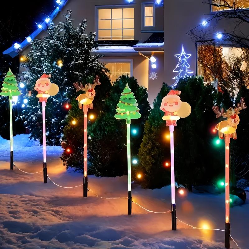 6-Pack Solar Christmas Decorative Lights Christmas-Themed LED Fairy Lights Featuring Santa Claus, Christmas Trees, and Reindeer Plastic Material IP44 Waterproof Rating Ideal for Lawn and Garden Pathway Decorations Holiday Decorations