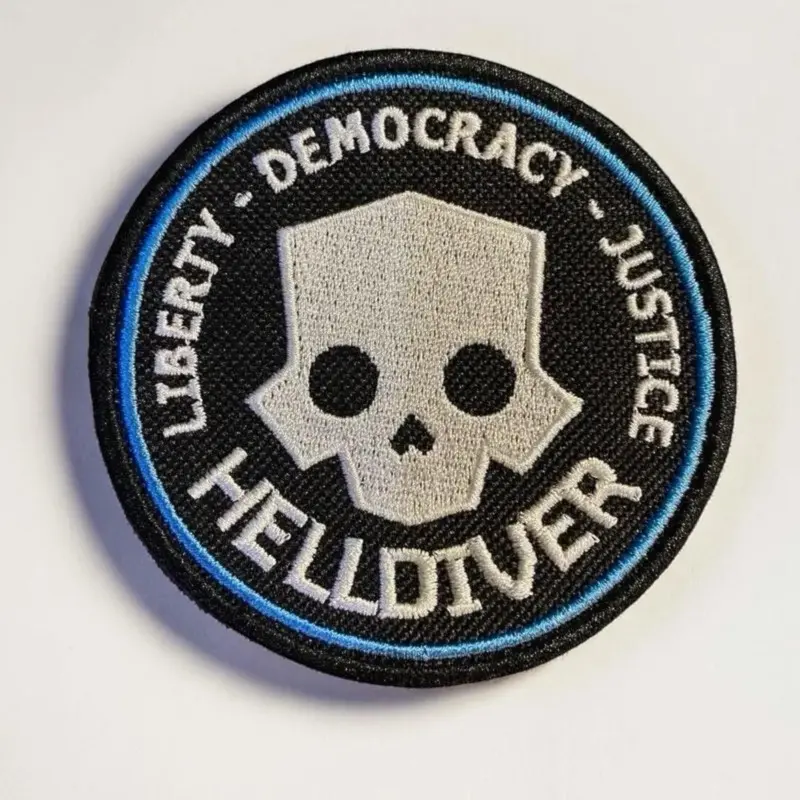 Durable Helldiver Skull Embroidered Morale Patch - 3.5in Round, Bold Liberty Democracy Justice Design with Bull Head, Geometric Details - Iron On, Sew On, Hook Backing for Gamers, Collectors, Morale Patches