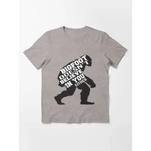 Bigfoot doesnt believe in you either funny christmas quotes  Essential T-Shirt