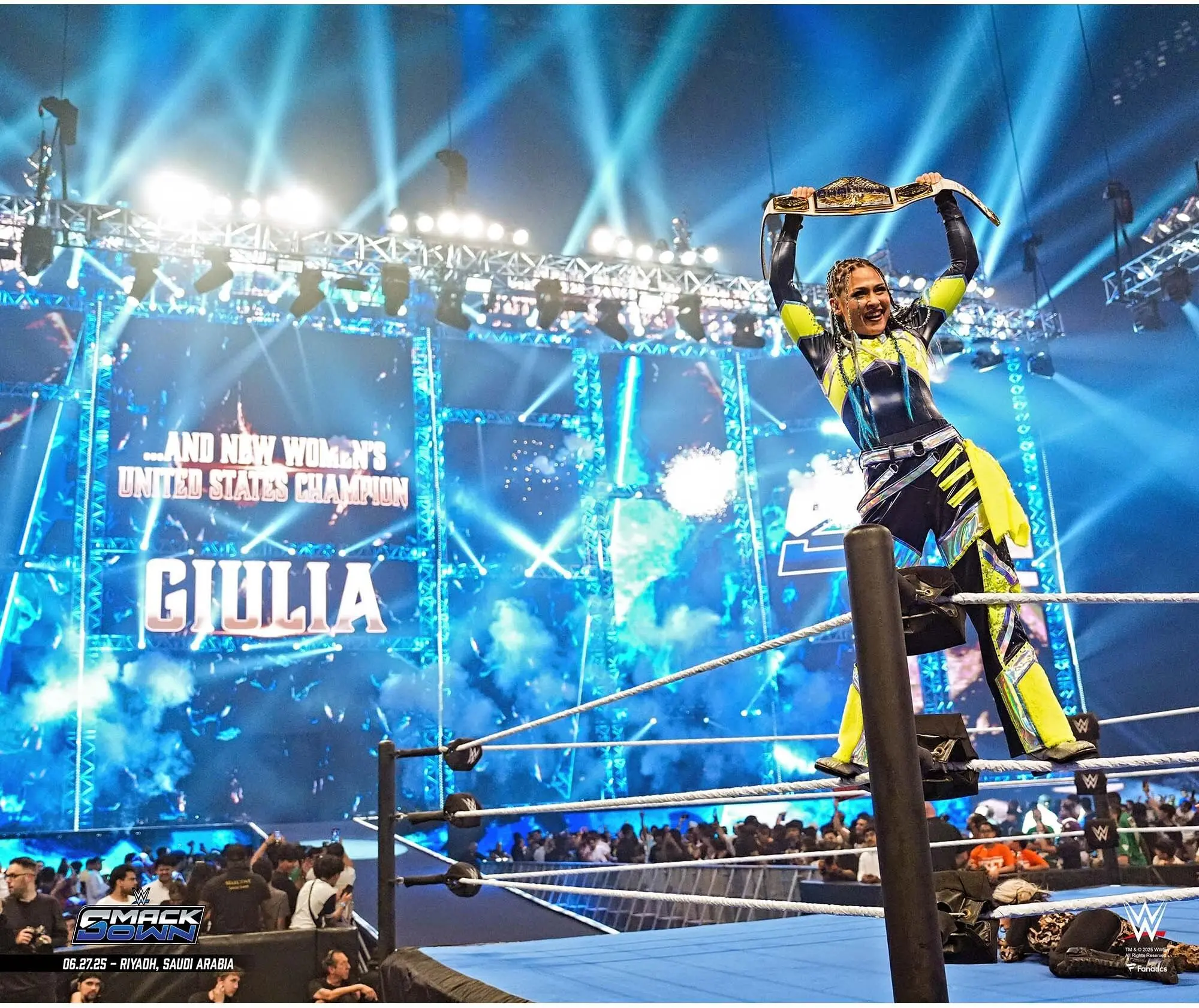 Giulia WWE Unsigned Raising Title Photograph - Wrestling Memorabilia