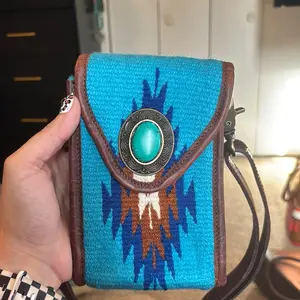 Saddle blanket and leather phone holder crossbody bag