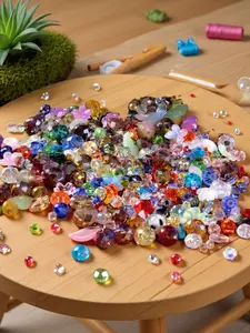 A box of 105g mixed glass beads of different styles, used for jewelry making, DIY lighting, arts and crafts, and decorative arts enthusiasts. Color crystal combinations are mixed in bulk