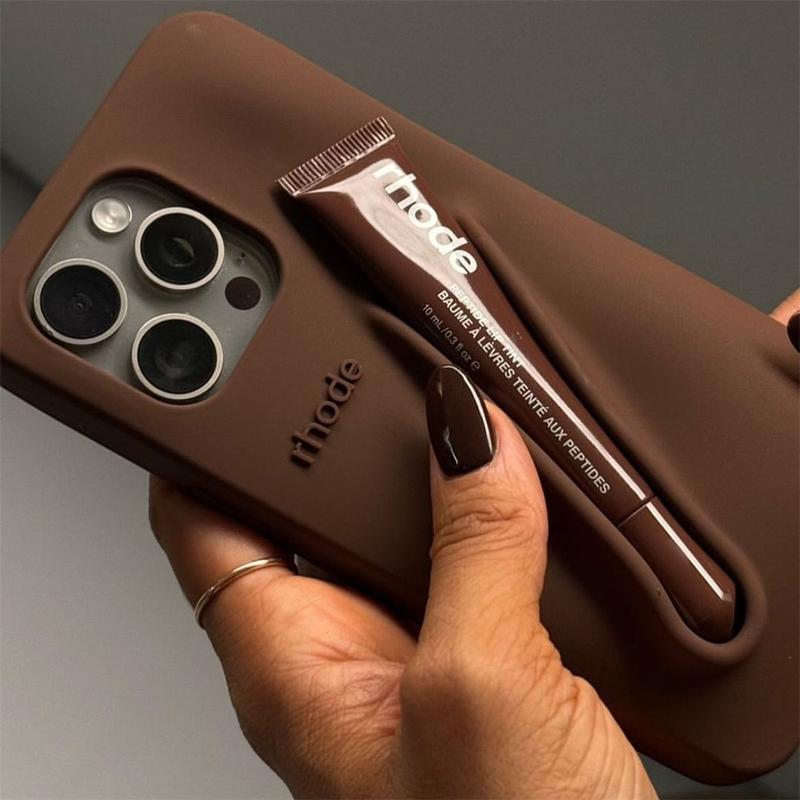 Silicone Phone Case with Integrated Lip Balm Slot for Rhode Peptide Lip Treatment.