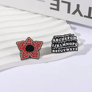 Spring new brooch -2 PCS  Anime themed enamel brooch set - featuring classic elements of letter walls and exotic flowers, suitable for drama fans and retro sci-fi style outfits