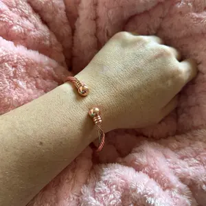 Thin High Polish Rose Swirl Couture Hollow Bangle