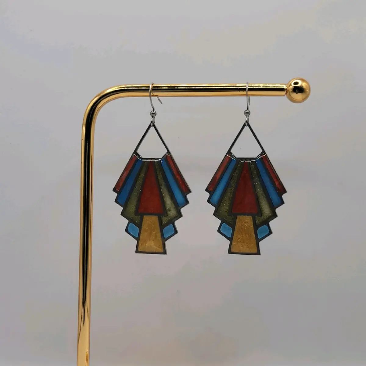 Let yoyr inner flapper girl sparkle (literally) with these beautiful art deco style earrings. They are green, yellow, blue and red. The actual measurements are just under 2.5" long and just over 1" wide. All products are nickel free.