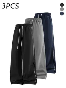3-pack men’s casual athletic pants with side stripes, adjustable drawstring elastic waistband, loose straight-leg fit