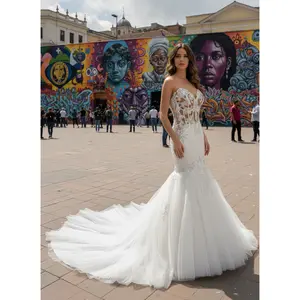 Heather Custom Mermaid Wedding Dress with hand beading by Brides & Tailor