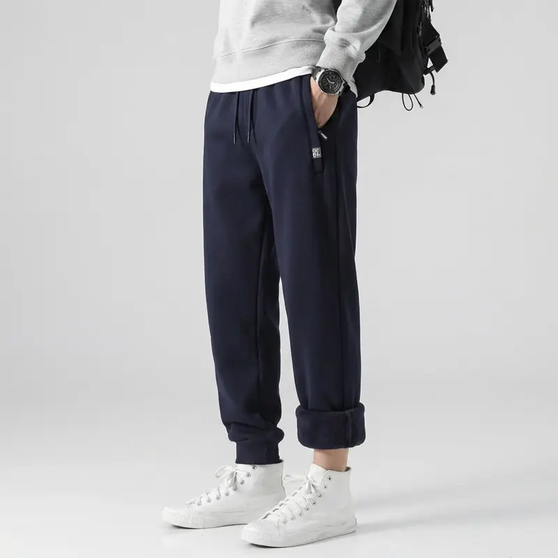 Everyday solid-color tapered jogger pants with a minimalist casual style, ribbed pant legs paired with side storage pockets, featuring a plush lining. Suitable for street outings and outdoor leisure, these basic, versatile pants are easy to pair. sohochic