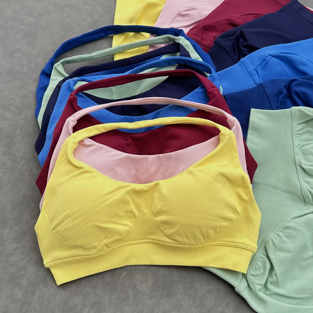 DFYNE halter neck sports bra with high-elasticity seamless bra padding, made of matte nylon fabric, provides high-intensity support for yoga and fitness. DFYNE halter neck sports bra with high-elasticity seamless bra padding, made of matte nylon fabric, provides high-intensity support for yoga and fitness.