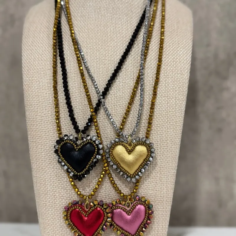 Beautiful long handmade heart necklaces. Beautiful long handmade heart necklaces.