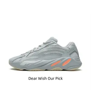 Soft grey upper with vibrant orange accents — this shoe blends calm tones with bold energy. The layered midsole offers cushioning for all-day wear, while the breathable mesh keeps feet cool during city walks or weekend errands.