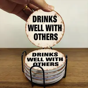 6-piece ceramic coaster set, featuring a vintage round sign design with the theme "Wine and Companionship," heat-resistant, non-slip coasters with holders for home dining and beverage decoration.