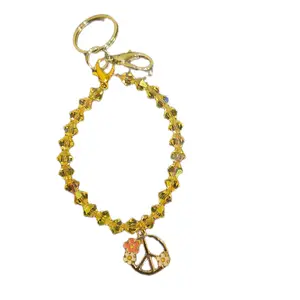 peace sign keychain woman key