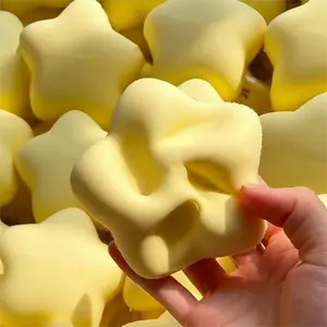 Squeezable flower toy, soft and slow-rebound design for stress relief, cute style, Kawaii Squishies, pink, milky white and light yellow gradient, five-petal flower shape, smooth jelly texture, desktop stress relief ornament for children, holiday gift.