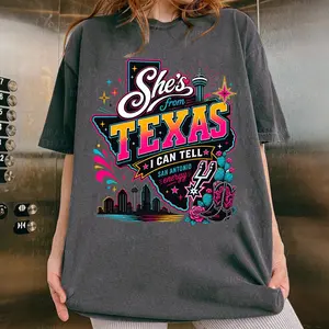 [Sale Up To 60%] Stylish Tom Spurs She's From Texas Spurs Fan Comfort Color Shirt, San Antonio Basketball Shirt, Silver and Black Game Day Graphic Tee, Texas Hoops Lover Shirt