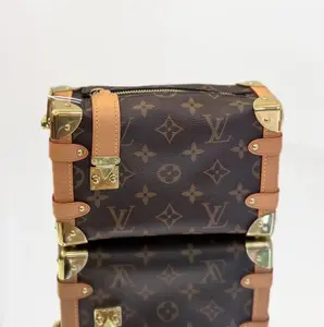 Pre-owned leather Shoulder Bags shoulder bag Louis Vuitton Petite Malle Trunk Bag in Monogram Canvas with Vachetta and Gold Tone Hardware