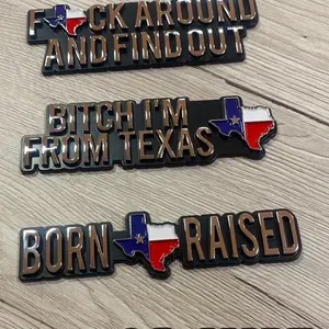 Texas Car Emblem - Black Background with Texas Flag Design, Featuring "FUCK AROUND AND FIND OUT" and "BORN RAISED" Text.