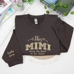 Embroidered This Mama Wears Her Heart Sweatshirt, Custom Mama Grandma Hoodie with Kids Names On Sleeve, Pregnancy Announcement Gifts, Mothers Day Gift Outfits