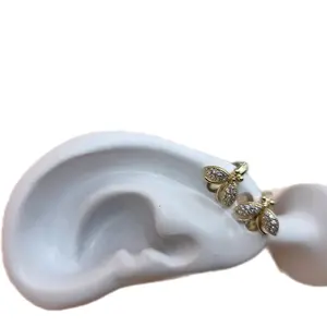 Huggie Earrings 14K Gold Plated Arracadas 14K Oro Laminado Elegant Design for Everyday Wear.