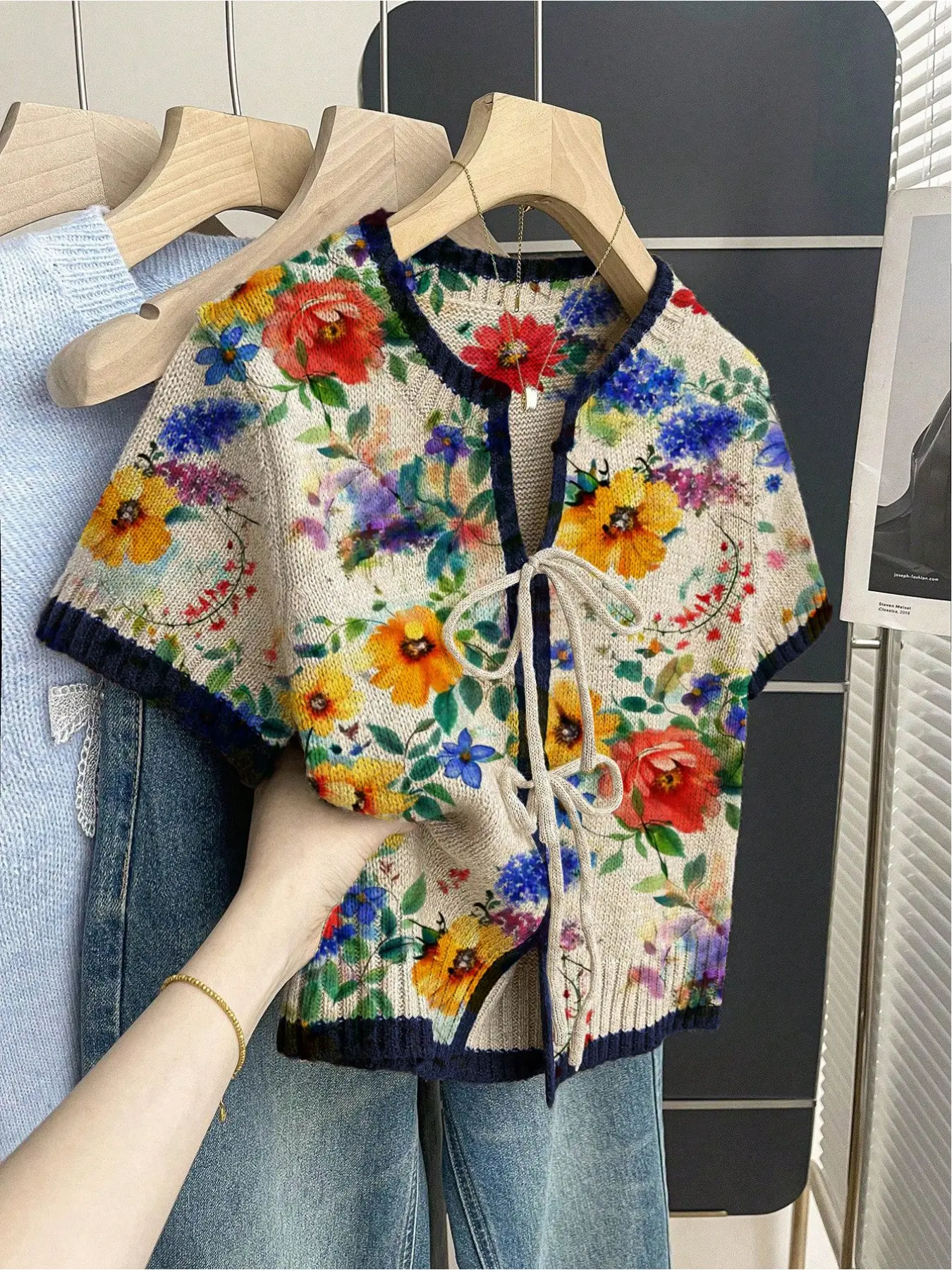Women's khaki bohemian vacation short-sleeve knit top. Loose round neck, contrast all-over Floral print, front tie and contrast piping. Comfortable for spring & summer casual wear.