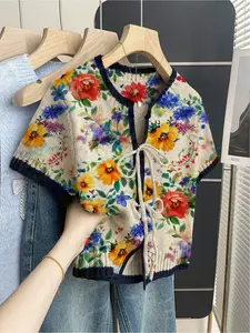 Women's khaki bohemian vacation short-sleeve knit top. Loose round neck, contrast all-over print, front tie and contrast piping. Comfortable for spring & summer casual wear.