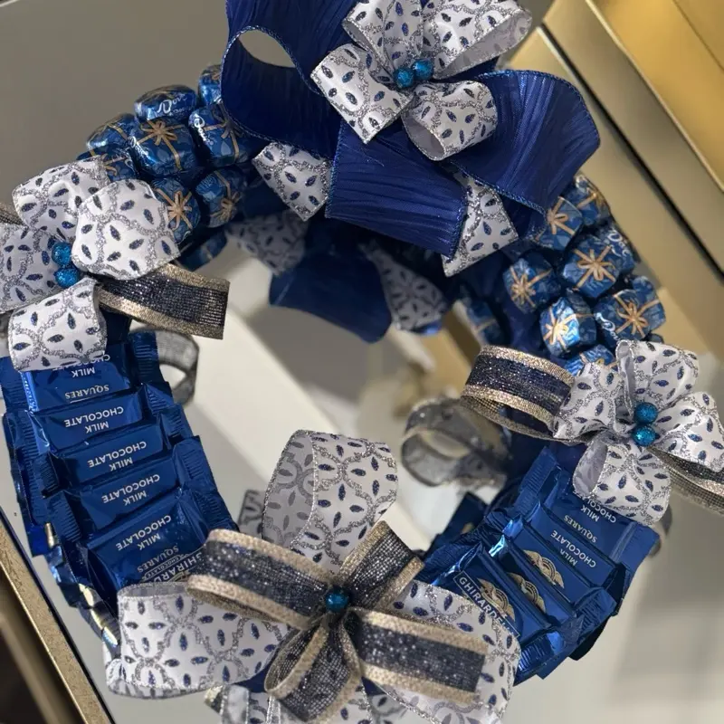 Royal Blue Ghirardelli Chocolate Wreath with Elegant Bow and Festive Design for Holiday Decor