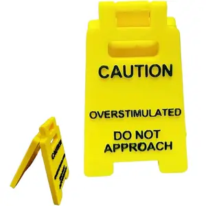 Caution Overstimulated Desk Sign - Yellow Sign Decoration with Black Text, Humor Gag Gift for Coworkers, Boss & Employees, Mini Novelty Desk Decor