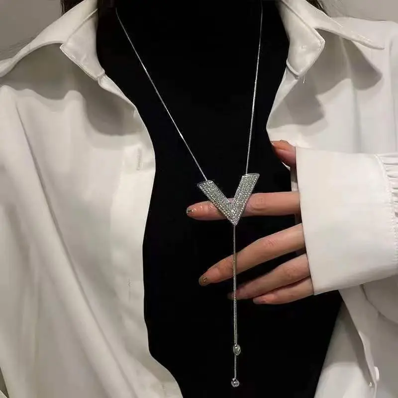 026v letter necklace