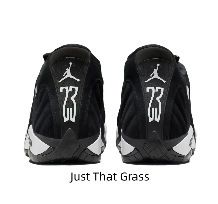 Black White Two-Tone Mid Top Basketball Sneakers Textured Black Upper Heel Tab Printed White Jumpman & Giant Number 23 Contrast White Outsole Accent Street Sport Trainers