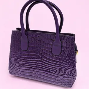 [Memorial Day Picks] A chic croc-embossed mini handbag with a glossy finish and structured silhouette. Features sturdy top handles, smooth lining, and elegant gold-tone zipper detail. Compact yet stylish, perfect for daily outings or dressy occasions.