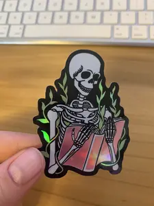 Holographic skeleton reading a book waterproof sticker