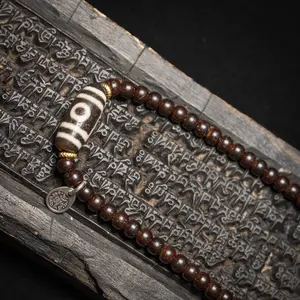 Double-Eyed Dzi Bead and Coconut Shell Necklace