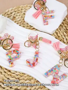 26 letter optional fashionable and cute butterfly glitter letter pendant/keychain, suitable for daily wear, vacation and dating occasions, and also a surprising and exquisite small gift.