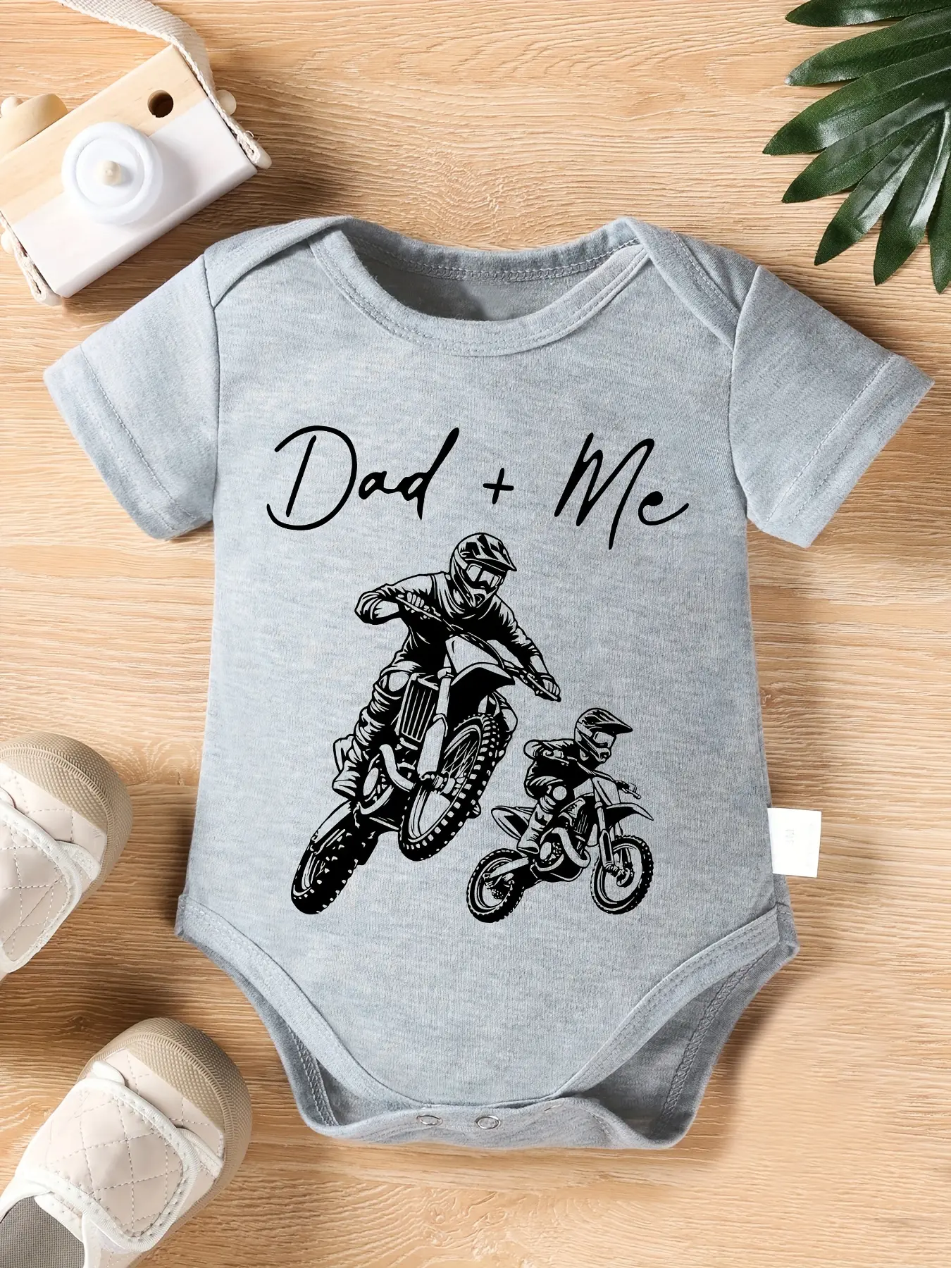 Baby Bodysuit with Father and Child Dirtbike Graphic, Short-Sleeve Motocross Bodysuit in Soft Cotton Blend with Snap Closures, Fitted