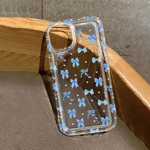 This blue, heart-shaped bow case features a shock-proof and non-slip TPU airbag design, compatible with iPhone 17, 16, 15, 14, 13, 12, 11, XS, X series, and more. It makes a great gift for friends or family.