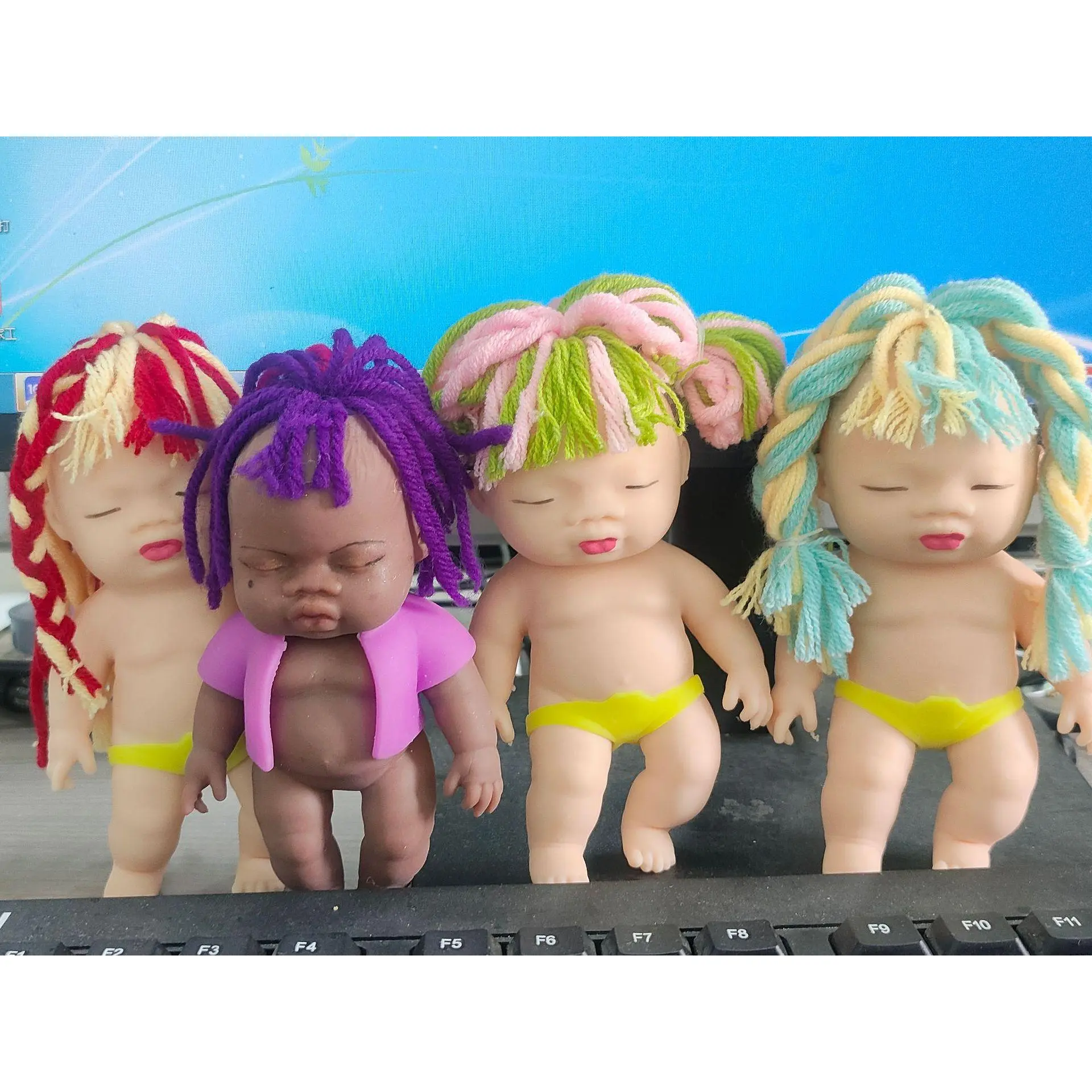 Brown woolen doll (random)