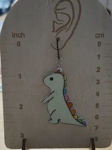 Teal dino plastic dangly earrings
