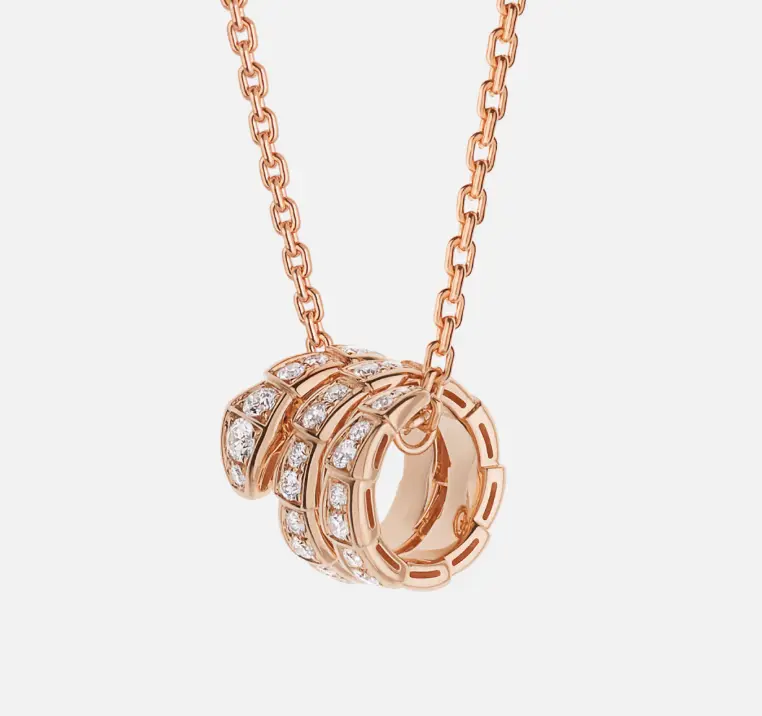 Pre-owned Bvlgari Serpenti Viper 18 kt rose gold pendant necklace set with full pave dia, full set