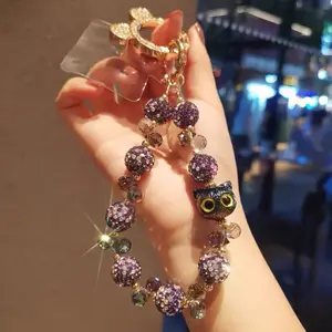 Luxurious and high-end sparkling crystal phone chain, fashionable cartoon phone lanyard, short wrist pendant, hand-held hanging chain