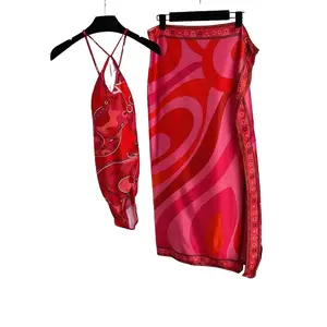 2 Piece Pink Swimwear and Skirt Set with Vibrant Red and Pink Patterns for Summer Beachwear