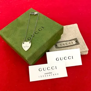 Pre-owned GUCCI Sterling Silver 925 (Ag925) Small Leather Goods Heart Tag Motif Silver 925 Bracelet