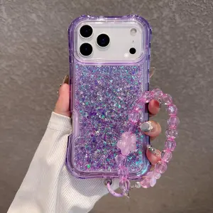 Fin 2-in-1 Four-corner Airbag Glitter Resin Bracelet Case For iPhone 17 Pro Max 17 Air 16e 16 Pro 15 Pro 14 + 13 12 11 Protect Cover